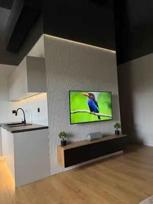 Telewizja i/lub zestaw kina domowego w obiekcie Apartament Warszawska