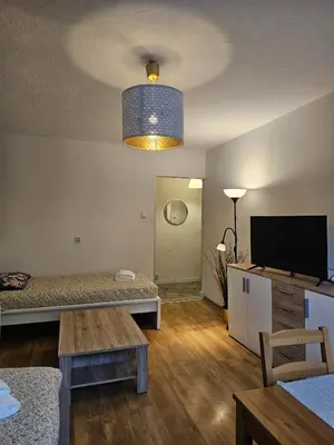 Telewizja i/lub zestaw kina domowego w obiekcie Justinrent Piekarska