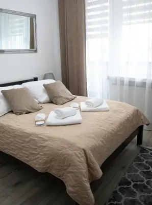 Łóżko lub łóżka w pokoju w obiekcie Hotel Piast