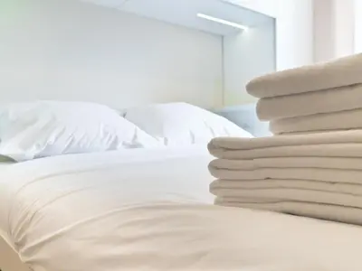Łóżko lub łóżka w pokoju w obiekcie Apartament Palisadowa by Enklawa