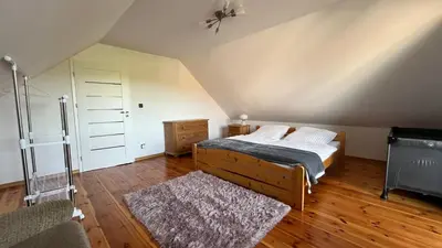 Łóżko lub łóżka w pokoju w obiekcie Stasiowe