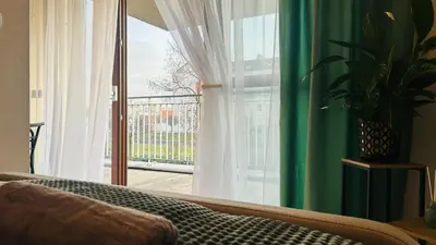 Łóżko lub łóżka w pokoju w obiekcie Apartament Słoneczny 16