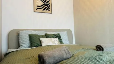 Łóżko lub łóżka w pokoju w obiekcie Apartament Słoneczny 16