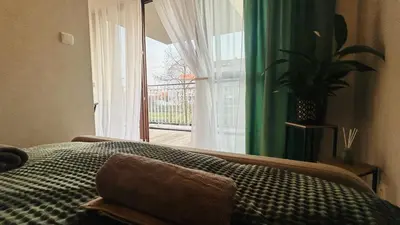 Łóżko lub łóżka w pokoju w obiekcie Apartament Słoneczny 16