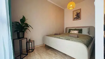 Łóżko lub łóżka w pokoju w obiekcie Apartament Słoneczny 16