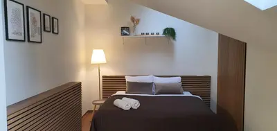 Łóżko lub łóżka w pokoju w obiekcie Villa Sjesta komfortowe apartamenty, prywatny parking, gratis parking w centrum miasta