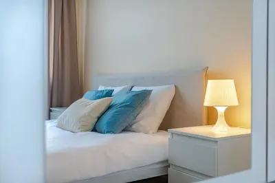 Łóżko lub łóżka w pokoju w obiekcie Apartament Odrzańskie Tarasy, Klimatyzacja, PW INVEST HOME