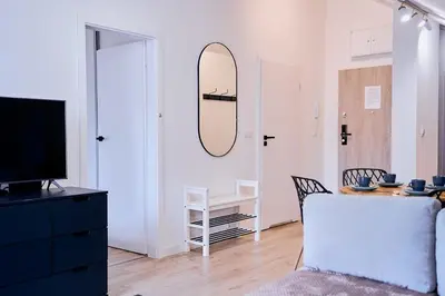 Telewizja i/lub zestaw kina domowego w obiekcie LAGUNA Apartament Polanica Residence 63-SPA