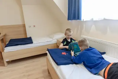 Łóżko lub łóżka w pokoju w obiekcie Jagusia