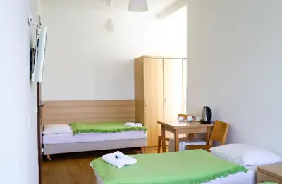 Łóżko lub łóżka w pokoju w obiekcie Jagusia