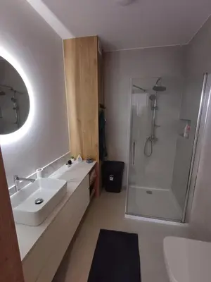 Łazienka w obiekcie Mieszkania i Apartamenty