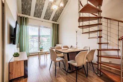 Telewizja i/lub zestaw kina domowego w obiekcie Vacation Club - Aleja Zwycięzców 3 Apartament 34
