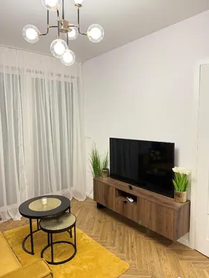 Telewizja i/lub zestaw kina domowego w obiekcie Apartament OMEGA