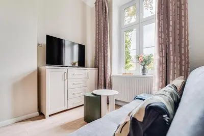Telewizja i/lub zestaw kina domowego w obiekcie Traugutta 60 by Homeprime