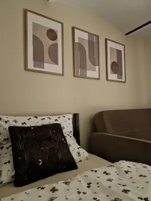 Łóżko lub łóżka w pokoju w obiekcie Leśne Zacisze