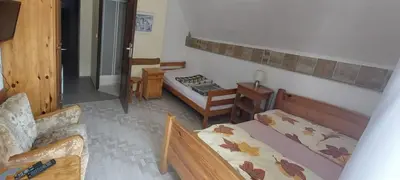 Łóżko lub łóżka w pokoju w obiekcie Gościniec, kwatery prywatne przy stoku w Zieleńcu