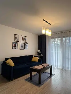 Część wypoczynkowa w obiekcie Apartament Enea z balkonem