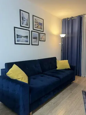 Część wypoczynkowa w obiekcie Apartament Enea z balkonem