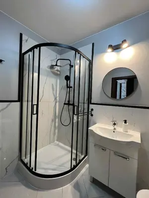 Łazienka w obiekcie Apartament Enea z balkonem