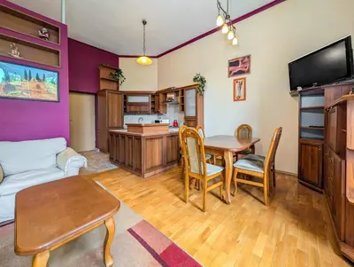 Telewizja i/lub zestaw kina domowego w obiekcie Podwale Central Apartment by BookingHost
