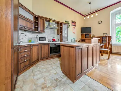 Kuchnia lub aneks kuchenny w obiekcie Podwale Central Apartment by BookingHost