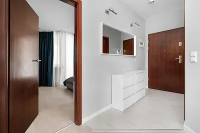 Łóżko lub łóżka w pokoju w obiekcie Krawiecka Wrocław Sky Loft by Solarento