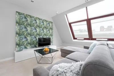 Telewizja i/lub zestaw kina domowego w obiekcie Krawiecka Wrocław Sky Loft by Solarento