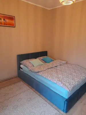 Łóżko lub łóżka w pokoju w obiekcie Mieszkanie w centrum Gogolina