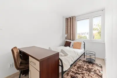 Łóżko lub łóżka w pokoju w obiekcie Nowy Świat 36 by Homeprime