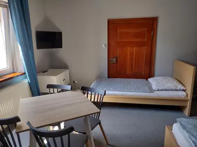 Łóżko lub łóżka w pokoju w obiekcie Agroturystyka Pod Orzechem