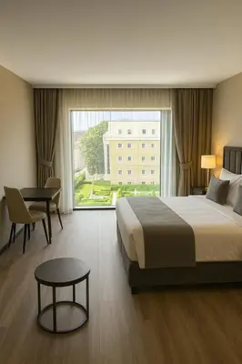 Łóżko lub łóżka w pokoju w obiekcie Aparthotel Opera Wrocław