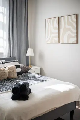Łóżko lub łóżka w pokoju w obiekcie Nice One Apartment Number 11 - W samym centrum!