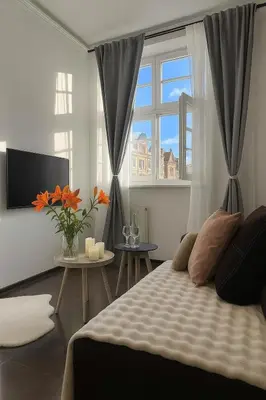 Łóżko lub łóżka w pokoju w obiekcie Nice One Apartment Number 11 - W samym centrum!