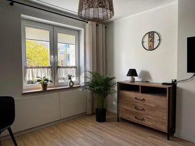 Telewizja i/lub zestaw kina domowego w obiekcie Apartament Muzyczny Kącik przy Rynku