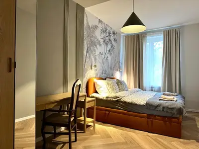 Łóżko lub łóżka w pokoju w obiekcie Kotlarska 39 Apartment - Self Check-In 20h