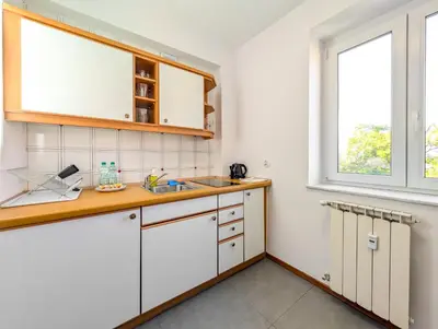 Kuchnia lub aneks kuchenny w obiekcie Rynek Wrocław Old Town Apartment by BookingHost