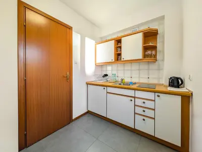 Kuchnia lub aneks kuchenny w obiekcie Rynek Wrocław Old Town Apartment by BookingHost