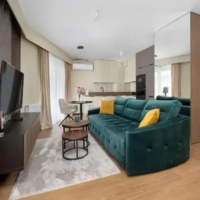 Stylish Apartment with Air Conditioning and Underground Parking by Noclegi Renters