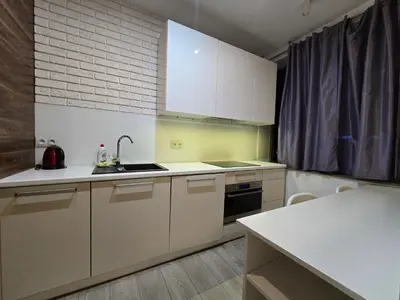 Kuchnia lub aneks kuchenny w obiekcie Happy Estate - ul Krawiecka 1