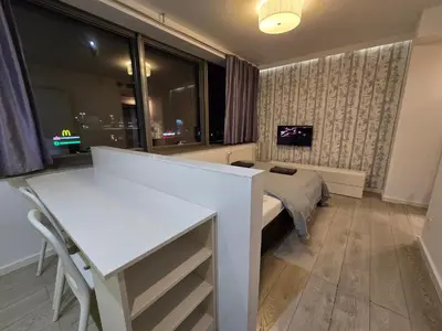 Łóżko lub łóżka w pokoju w obiekcie Happy Estate - ul Krawiecka 1