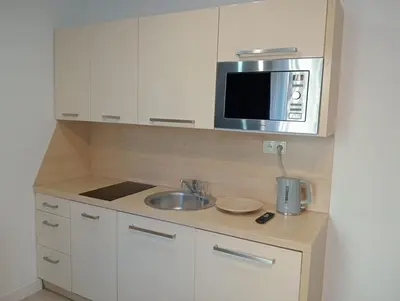 Kuchnia lub aneks kuchenny w obiekcie Happy Estate - ul Krawiecka 1