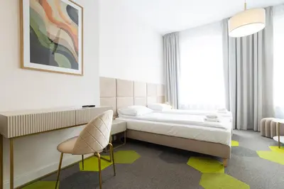 Łóżko lub łóżka w pokoju w obiekcie Moon Apartments Wrocław