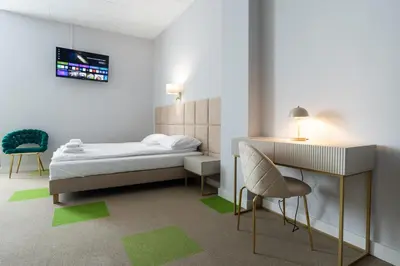 Łóżko lub łóżka w pokoju w obiekcie Moon Apartments Wrocław