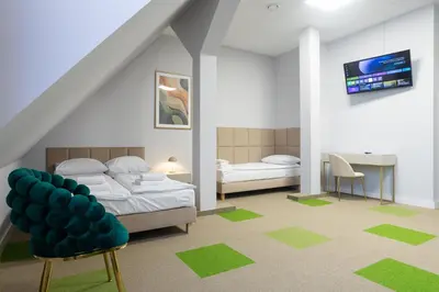 Łóżko lub łóżka w pokoju w obiekcie Moon Apartments Wrocław