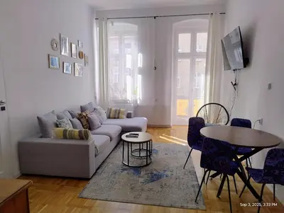 Część wypoczynkowa w obiekcie Piastowska Apartment