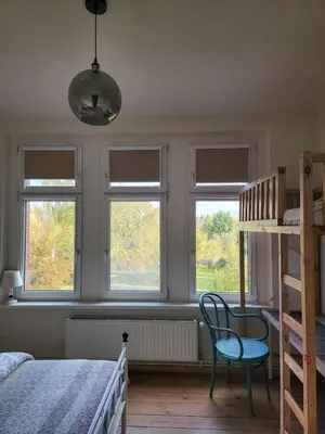 Łóżko lub łóżka w pokoju w obiekcie Apartment Nowe Gliwice