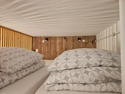 Łóżko lub łóżka w pokoju w obiekcie Apartament z antresolą Stare Miasto