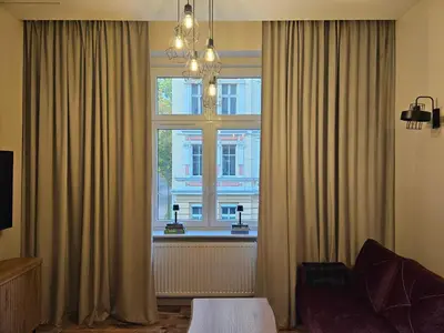 Telewizja i/lub zestaw kina domowego w obiekcie Apartament z antresolą Stare Miasto
