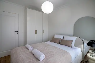 Łóżko lub łóżka w pokoju w obiekcie RentPlanet - Apartament Braniborska 74