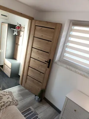Łóżko lub łóżka w pokoju w obiekcie Apartament w Słupcu z PS5 WIFI HBO